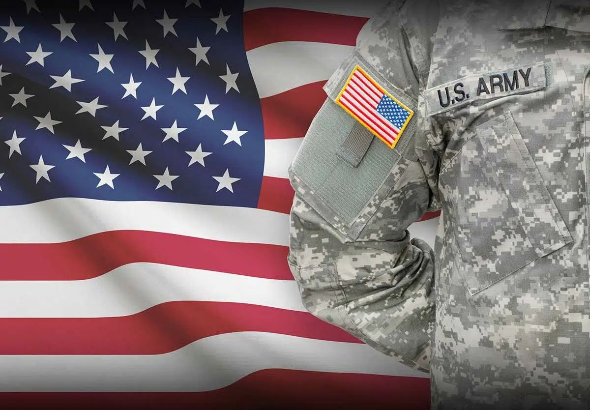 Proud veterans with American flag - Veterans life insurance coverage